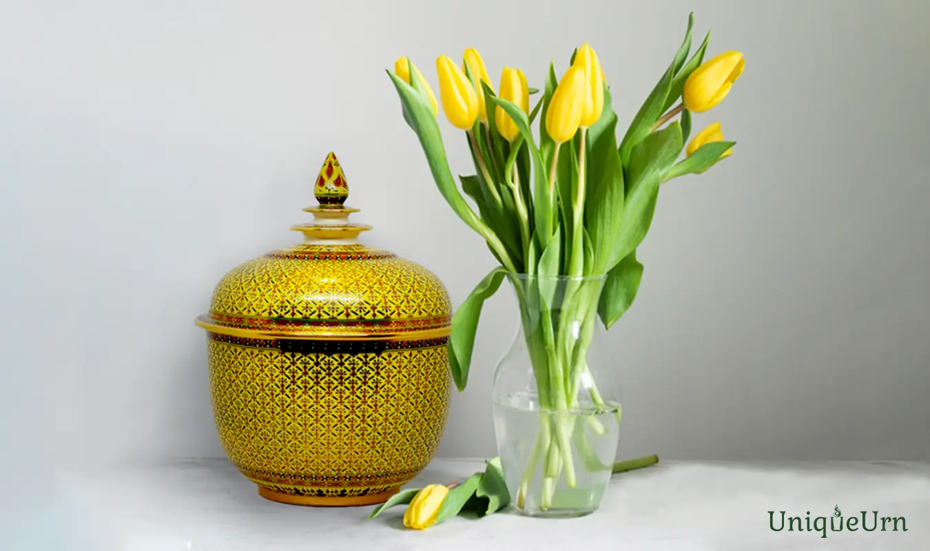 Thochan shapes an artistic memorial urn for ashes by UniqueUrn placed in a peaceful home sanctuary, symbolizing the eternal presence and continuing bonds through artisan craftsmanship.