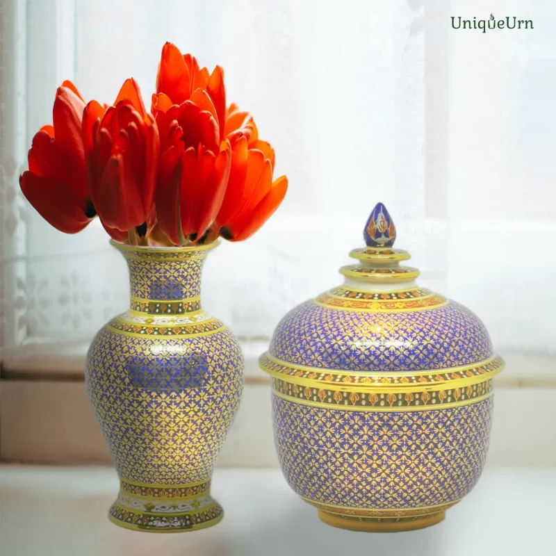 A dignified memorial corner featuring a UniqueUrn Bencharong memorial keepsake urn and a vase of flowers, preserving eternal family bonds at home.