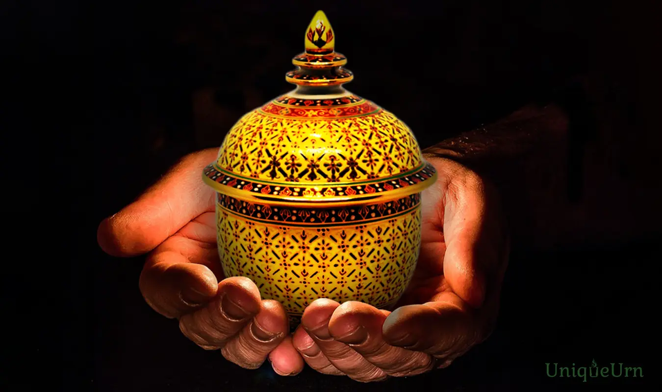 Handcrafted Tactile embossed gold patterns on Bencharong 3” Thochan keepsake urn for ashes for child grief support.