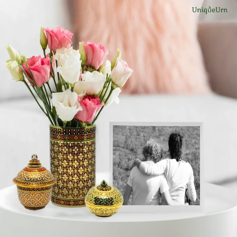 UniqurUrn’s memorial Art of handcrafted Bencharong Thochan keepsake urns and a vase as a symbolic bridge for healing grief and continuing bonds.