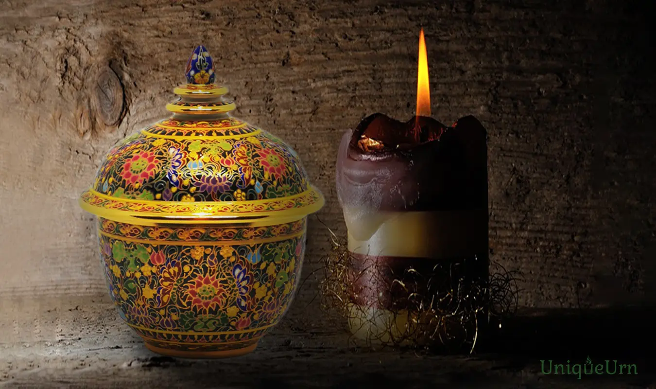 Tactile embossed gold patterns on hand-painted luxury Bencharong art of 3” Thocha keepsake urn for child grief support.