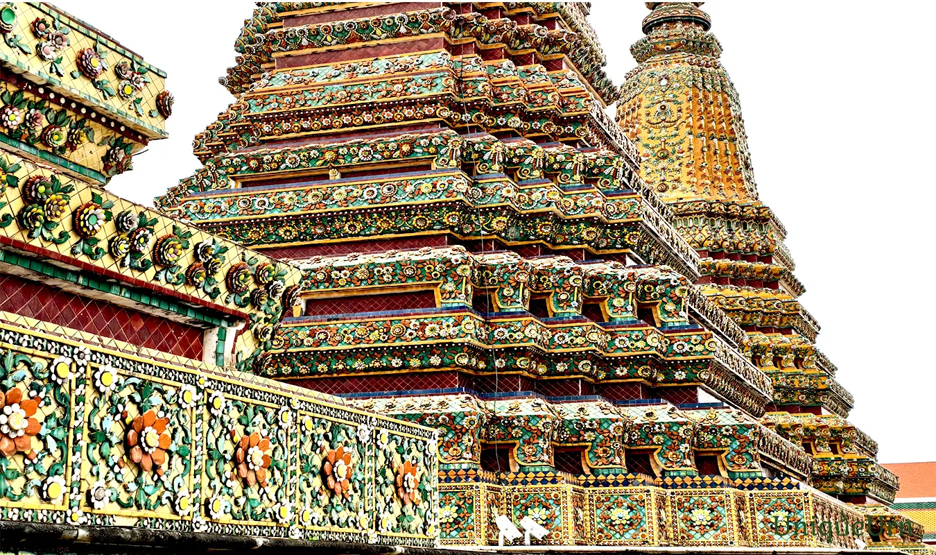 Meticulous porcelain floral ornamentation on the Great Stupas of Wat Pho represents a fusion of Thai and Chinese art styles - memorial arts as UniqueUrn.