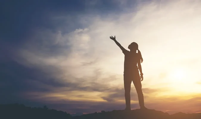 A lady reaches out to touch the sky when standing on the top of a mountain to find out the truth about The Art Of Leaving Wisdom And The True Meaning Of Life. Memories of relationships bind people to life, beautifully honored by UniqueUrn's hand-painted Thai Bencharong art urns for ashes.